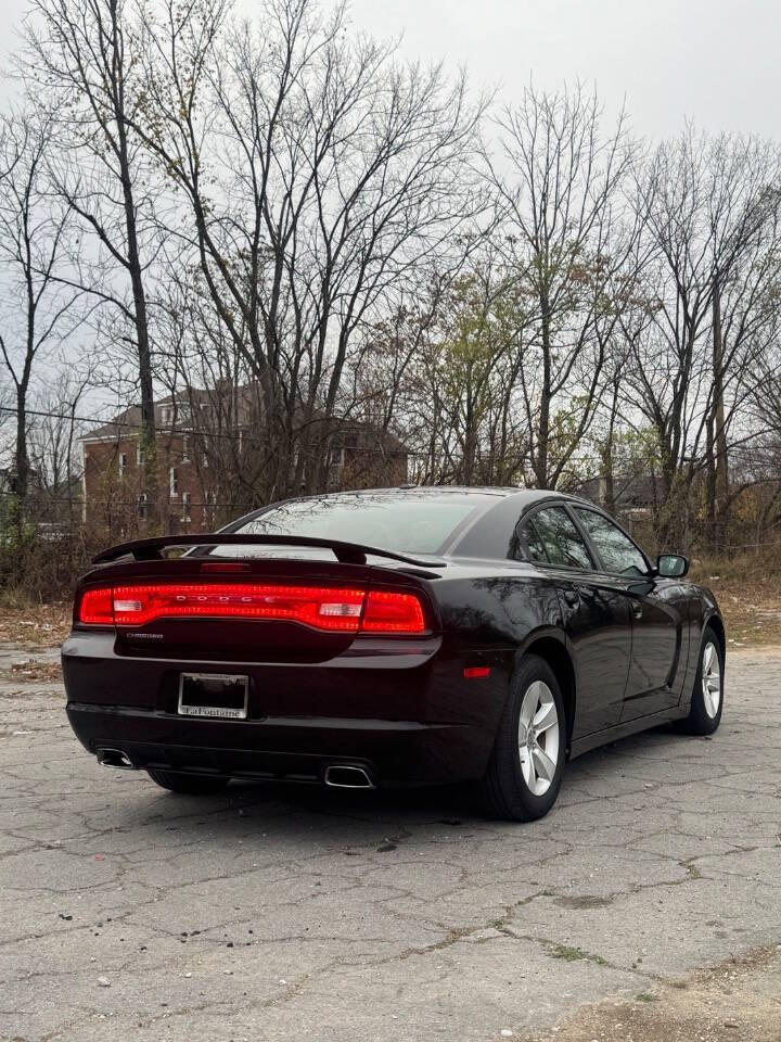 2012 Dodge Charger for sale at H & H AUTO GROUP in Detroit, MI