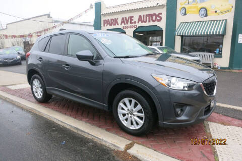 2014 Mazda CX-5 for sale at PARK AVENUE AUTOS in Collingswood NJ