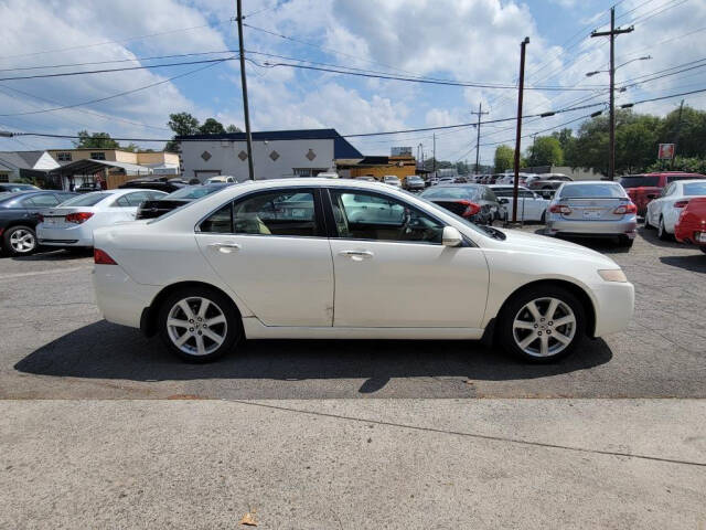 2005 Acura TSX for sale at DAGO'S AUTO SALES LLC in Dalton, GA