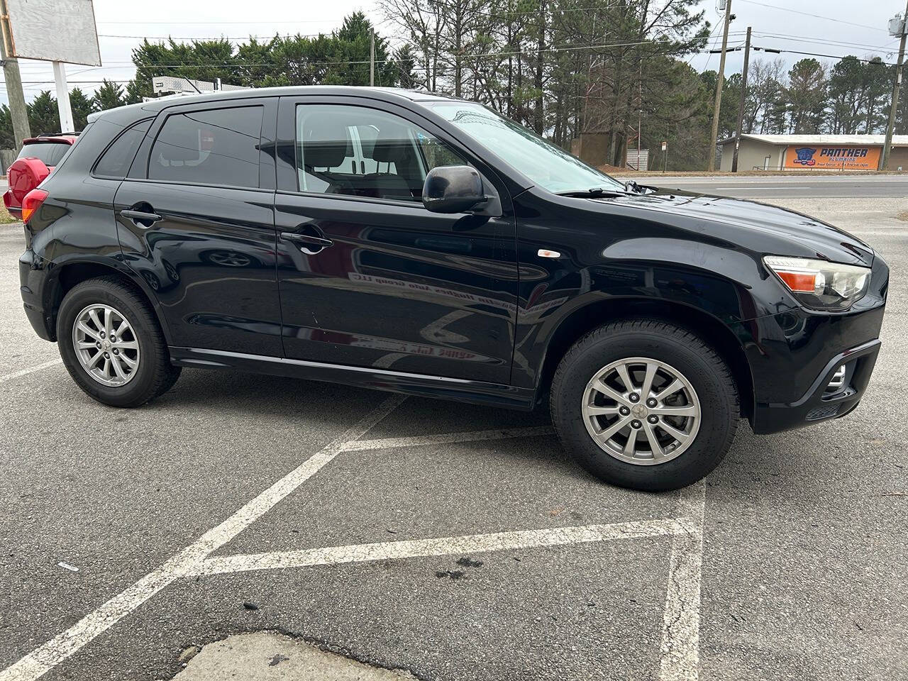 2012 Mitsubishi Outlander Sport for sale at Justin Hughes Auto Group LLC in Douglasville, GA