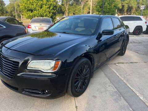 2013 Chrysler 300 for sale at Azteca Auto Sales LLC in Des Moines IA