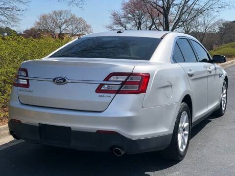 2014 Ford Taurus for sale at William D Auto Sales in Norcross GA