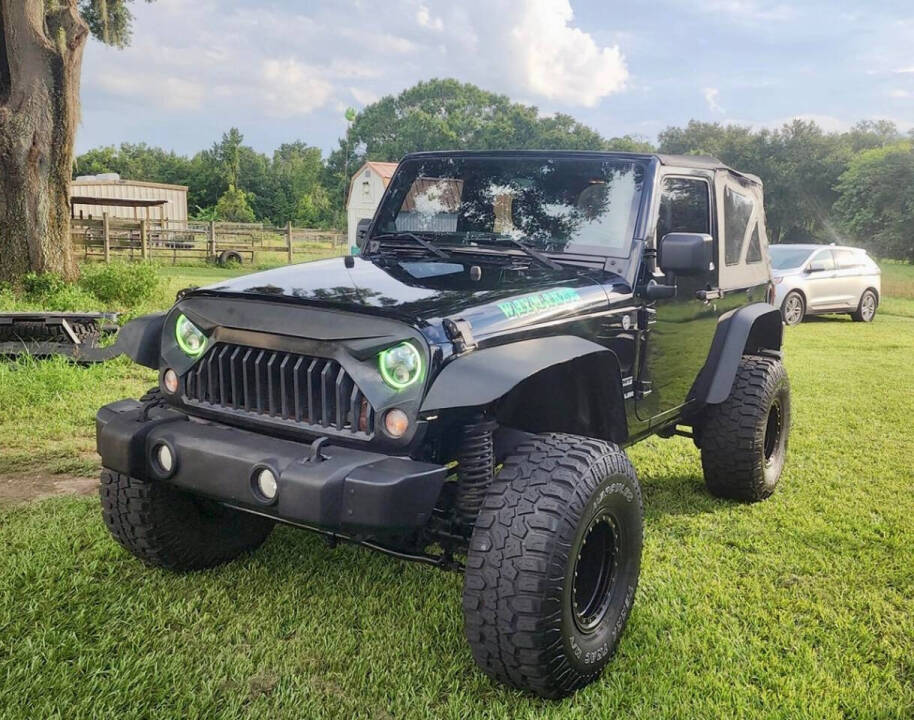 2014 Jeep Wrangler for sale at Salem Auto, INC. in Lake Park, FL