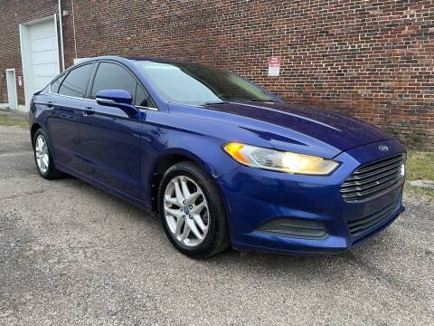 2013 Ford Fusion for sale at Jim's Hometown Auto Sales LLC in Byesville OH