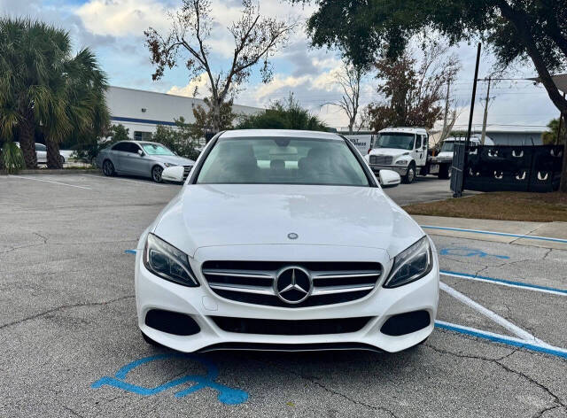 2015 Mercedes-Benz C-Class for sale at Zoom Auto Exchange LLC in Orlando, FL