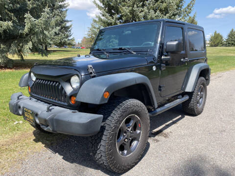 2013 Jeep Wrangler for sale at BELOW BOOK AUTO SALES in Idaho Falls ID