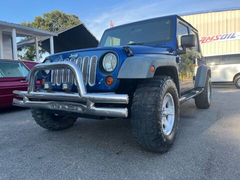 2009 Jeep Wrangler Unlimited for sale at RoMicco Cars and Trucks in Tampa FL