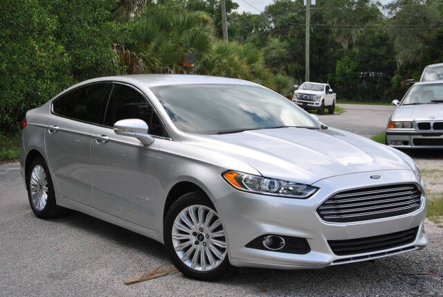 2014 Ford Fusion Hybrid for sale at Elite Auto Specialties LLC in Deland, FL