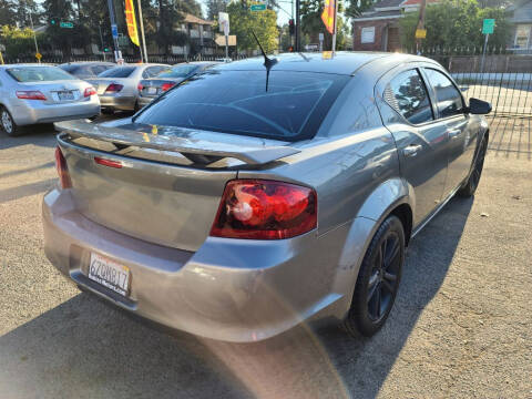 2012 Dodge Avenger for sale at ROBLES MOTORS in San Jose CA