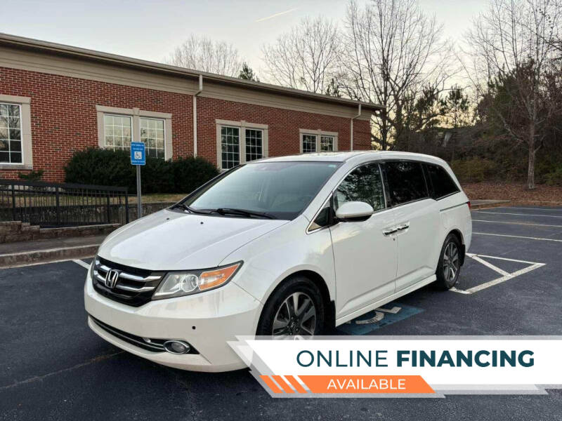 2015 Honda Odyssey for sale at Two Brothers Auto Sales in Loganville GA