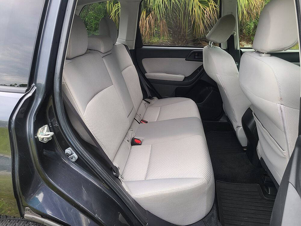 2014 Subaru Forester for sale at Flagler Auto Center in Bunnell, FL