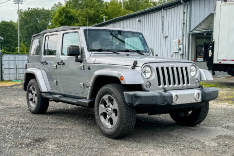 2016 Jeep Wrangler Unlimited for sale at John's Automotive in Pittsfield MA