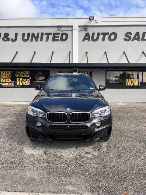 2019 BMW X6 for sale at M & J UNITED AUTO SALES in LAUDERDALE LAKES, FL