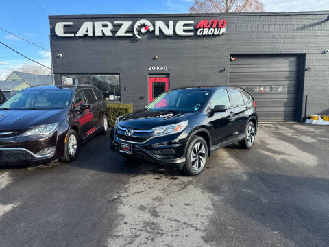 2015 Honda CR-V for sale at CarZone Auto Group in Warren MI