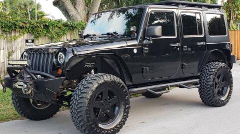2013 Jeep Wrangler Unlimited for sale at Xtreme Motors in Hollywood FL