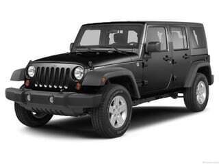 2013 Jeep Wrangler Unlimited for sale at Jensen Le Mars Used Cars in Le Mars IA