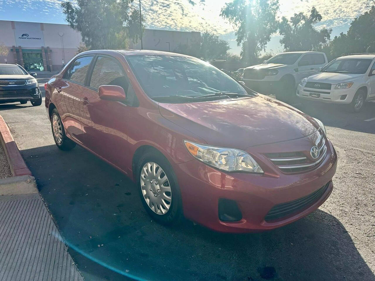 2013 Toyota Corolla for sale at HUDSONS AUTOS in Gilbert, AZ