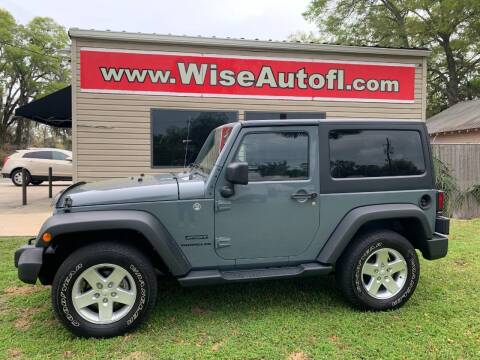 2014 Jeep Wrangler for sale at WISE AUTO SALES in Ocala FL