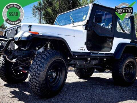 1990 Jeep Wrangler for sale at Street Smart Auto Brokers in Colorado Springs CO