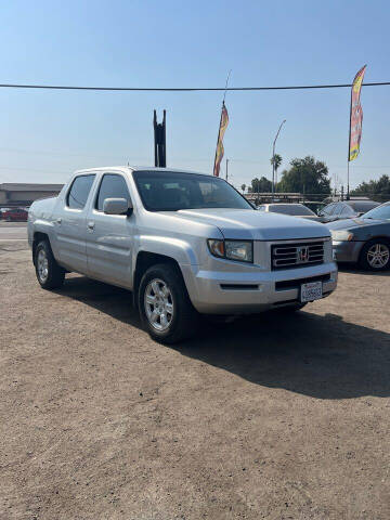 2006 Honda Ridgeline for sale at AUTCO AUTO SALES in Fresno CA