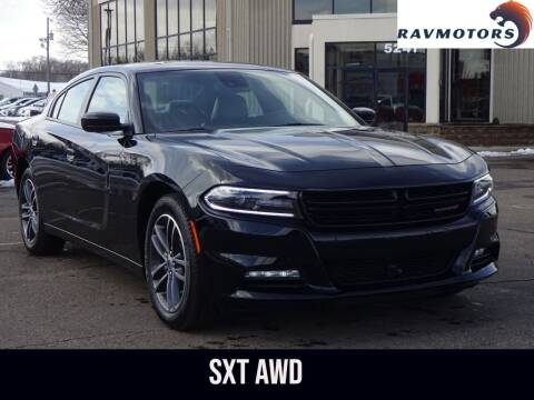 2019 Dodge Charger for sale at RAVMOTORS - CRYSTAL in Crystal MN
