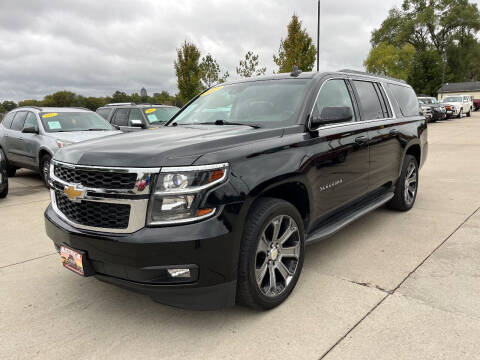 2015 Chevrolet Suburban for sale at Azteca Auto Sales LLC in Des Moines IA