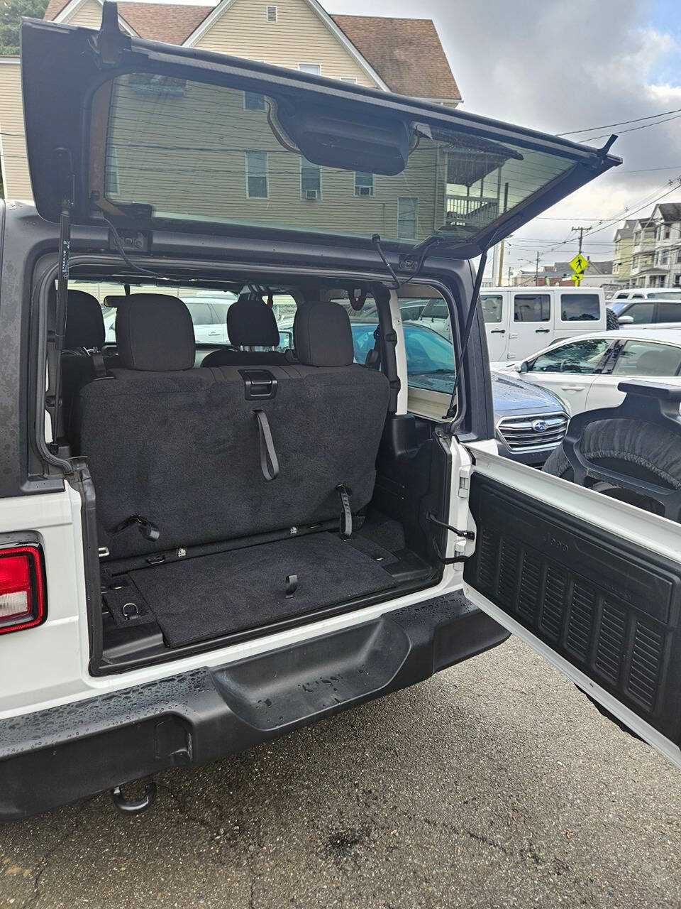 2020 Jeep Wrangler for sale at RENOS AUTO SALES LLC in Waterbury, CT