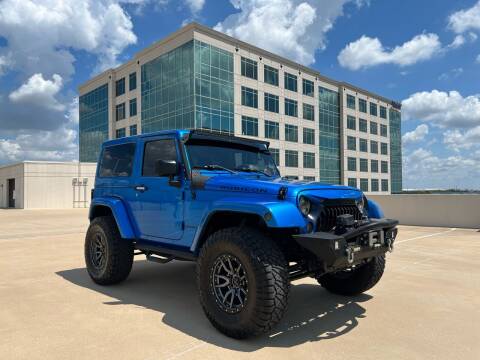 2015 Jeep Wrangler for sale at Signature Autos in Austin TX