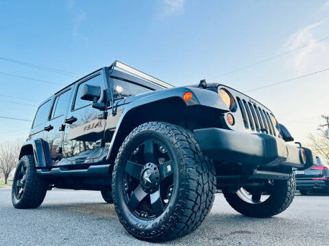 2013 Jeep Wrangler Unlimited for sale at Trimax Auto Group in Norfolk VA