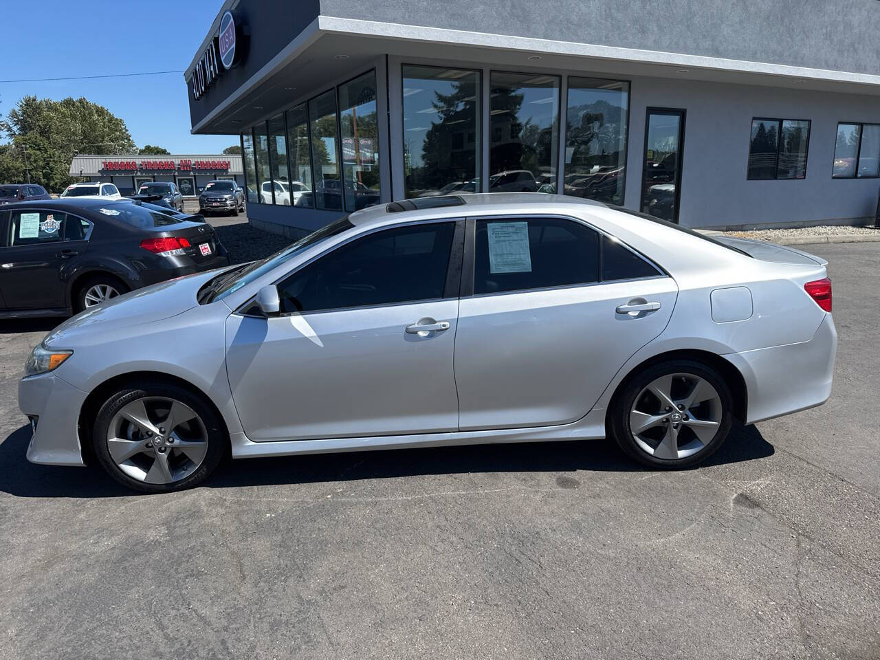 used 2014 Toyota Camry car, priced at $9,999