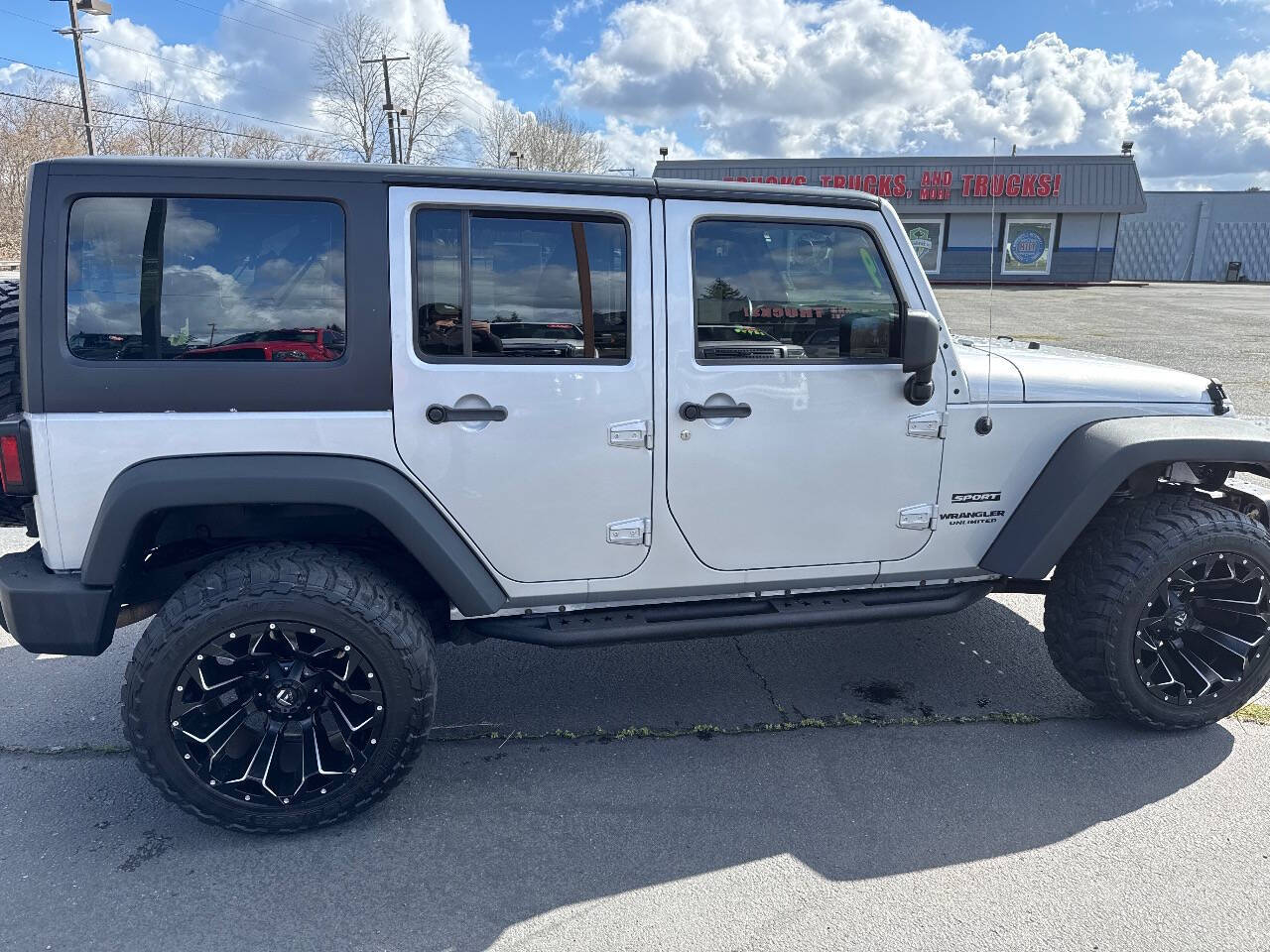 used 2012 Jeep Wrangler Unlimited car, priced at $15,999