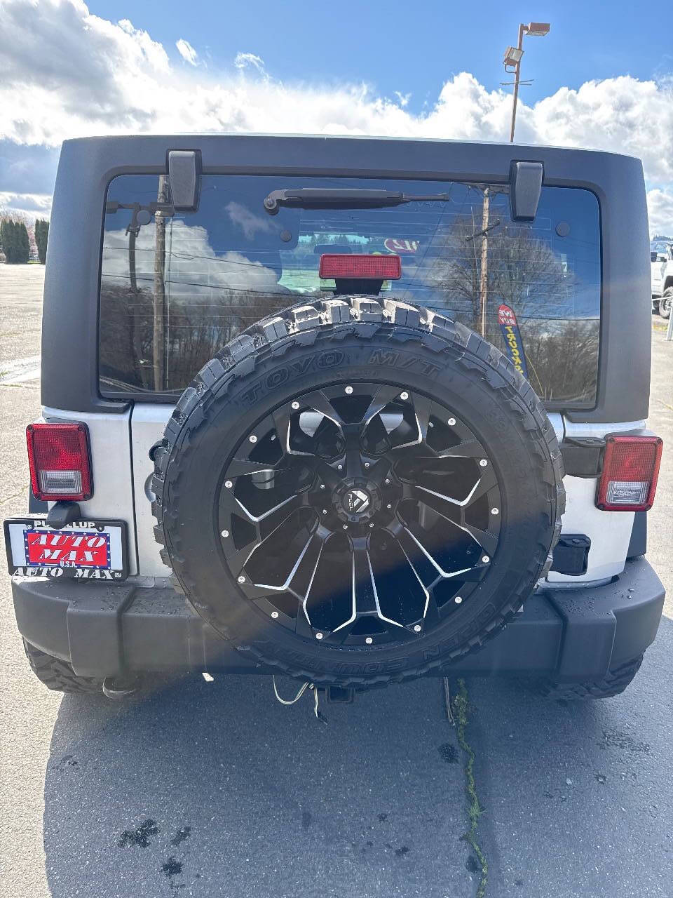 used 2012 Jeep Wrangler Unlimited car, priced at $15,999