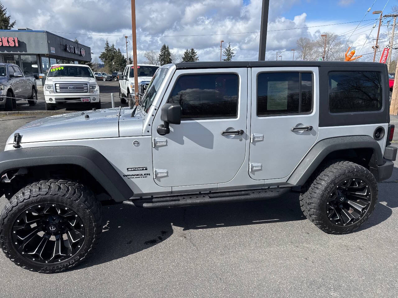 used 2012 Jeep Wrangler Unlimited car, priced at $15,999